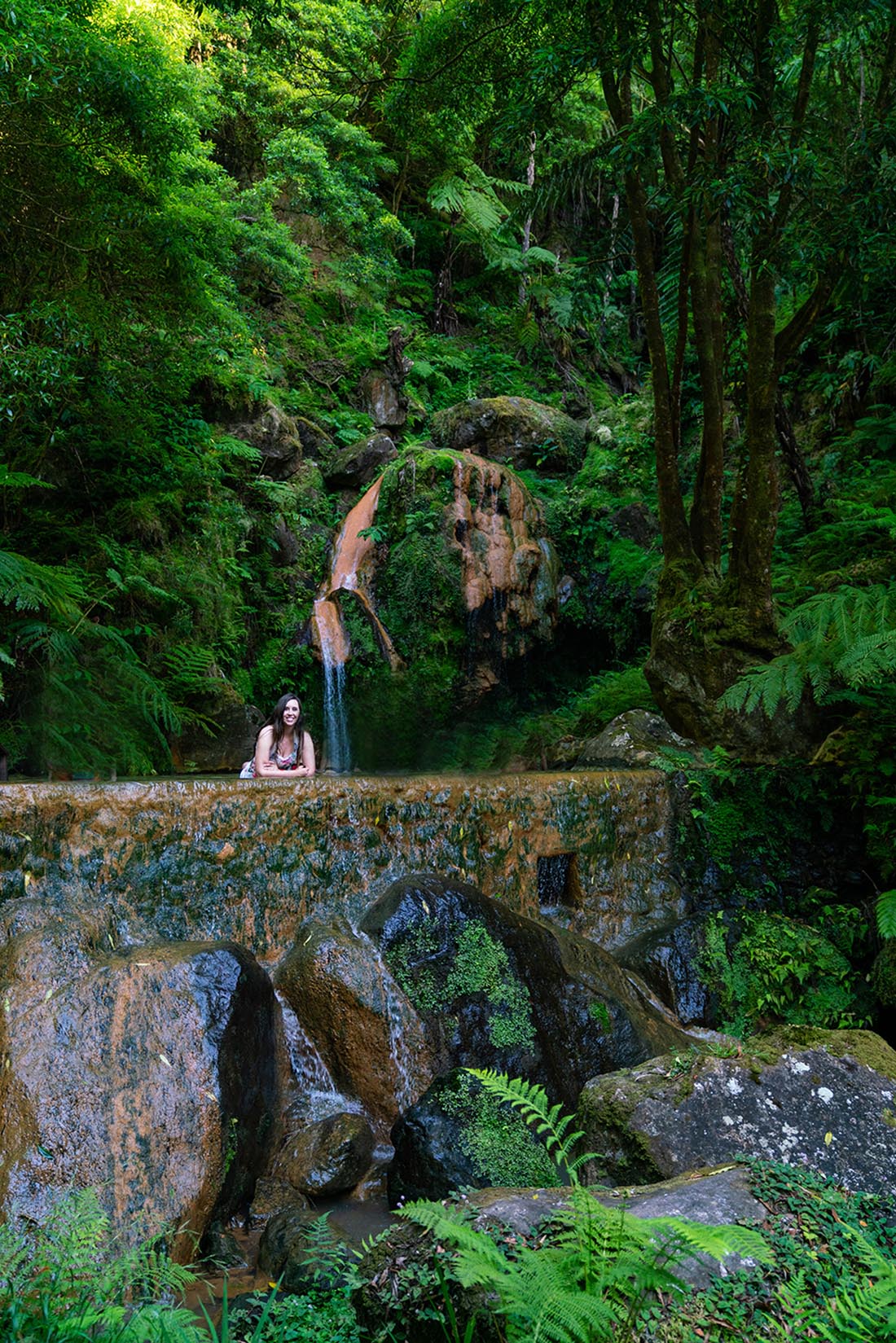 Sao Miguel Azores Velha Hot Springs - woman sitting in a hot spring