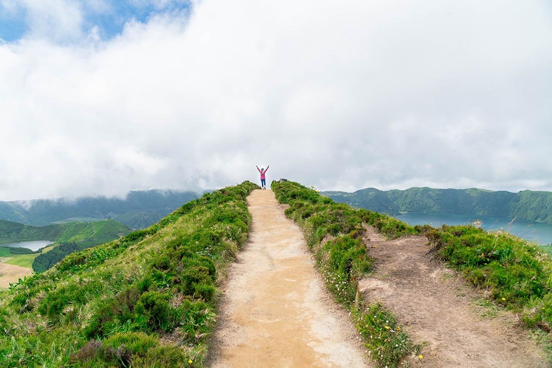 Sao Miguel Azores -a woman standing at the top of the hill