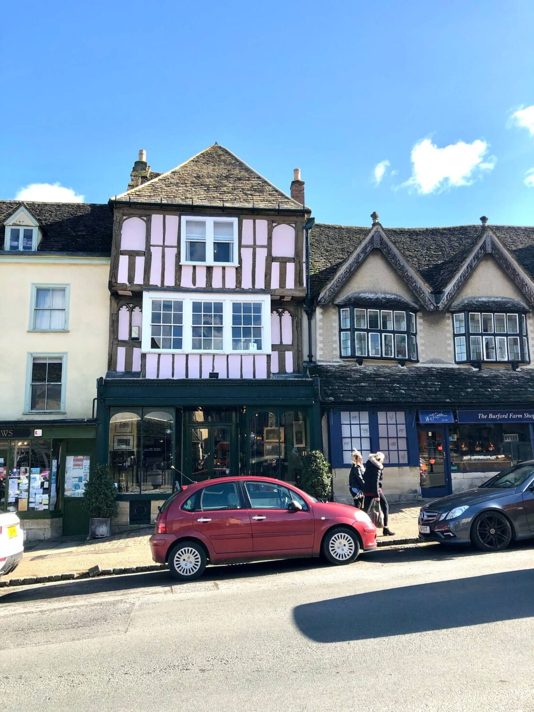 Most Beautiful Cotswolds Villages - a pink half timber house in Burford 