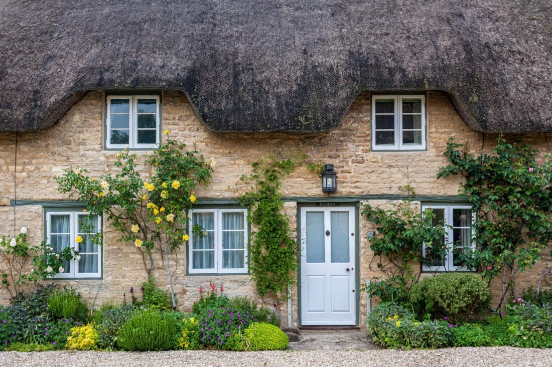 Most Beautiful Cotswolds Villages a thatched cottage in minster lovell