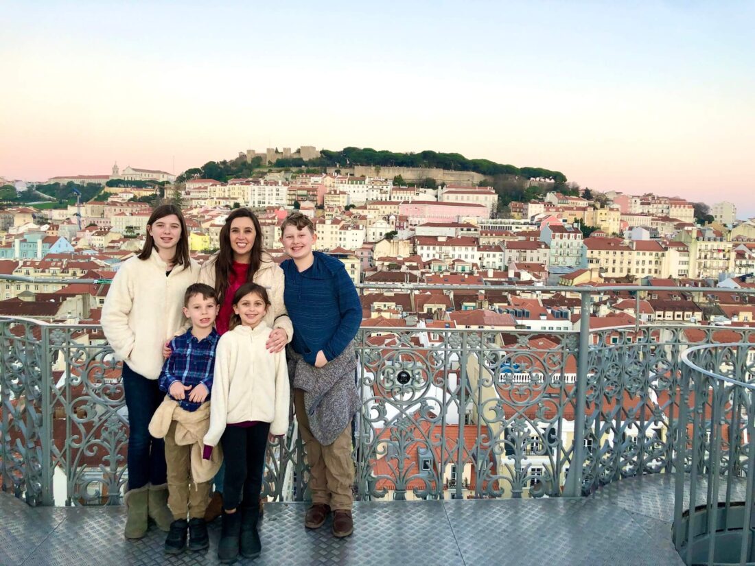 Where to Stay in Lisbon Portugal - Group of kids overlooking the city of Lisbon.
